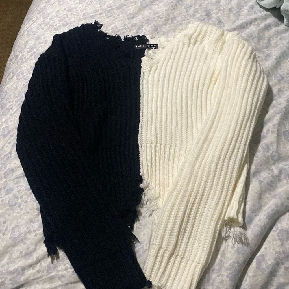 white and black split sweater